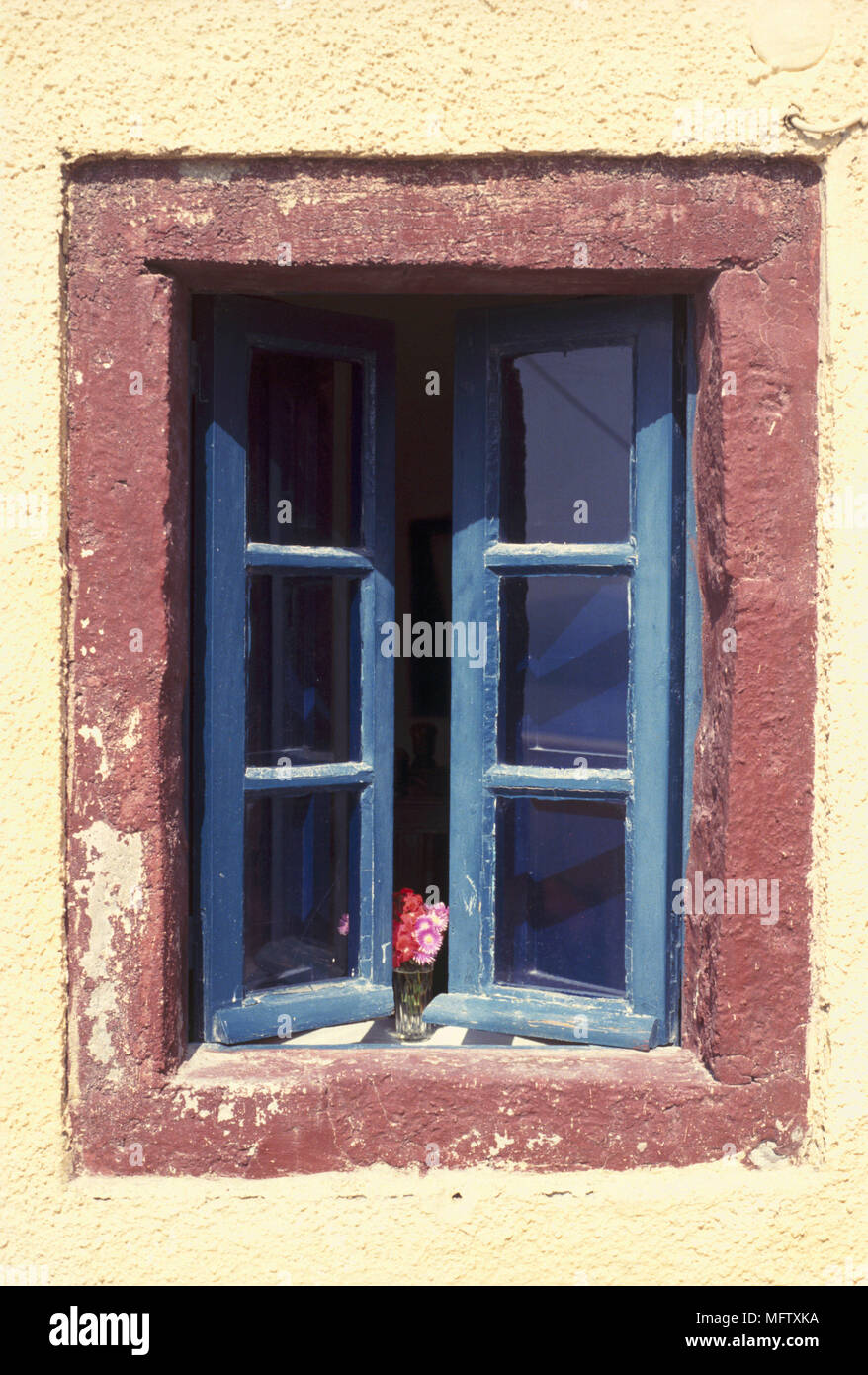 A detail of the exterior of a rustic stone, painted window Stock Photo ...