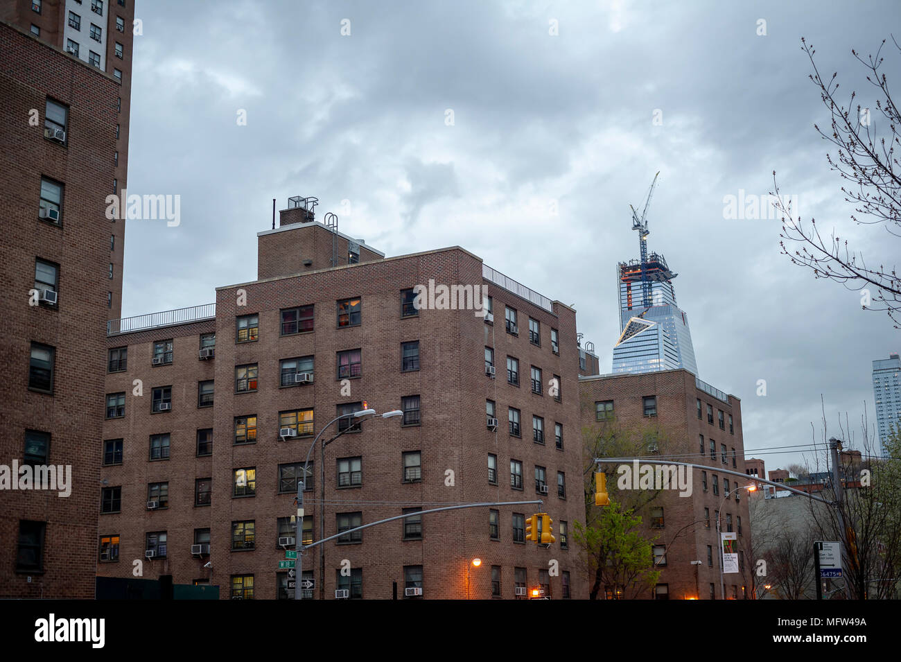 The massive Hudson Yards development looms over the NYCHA Fulton Houses complex of apartments in Chelsea in New York on Tuesday, April 24, 2018.  (© Richard B. Levine) Stock Photo