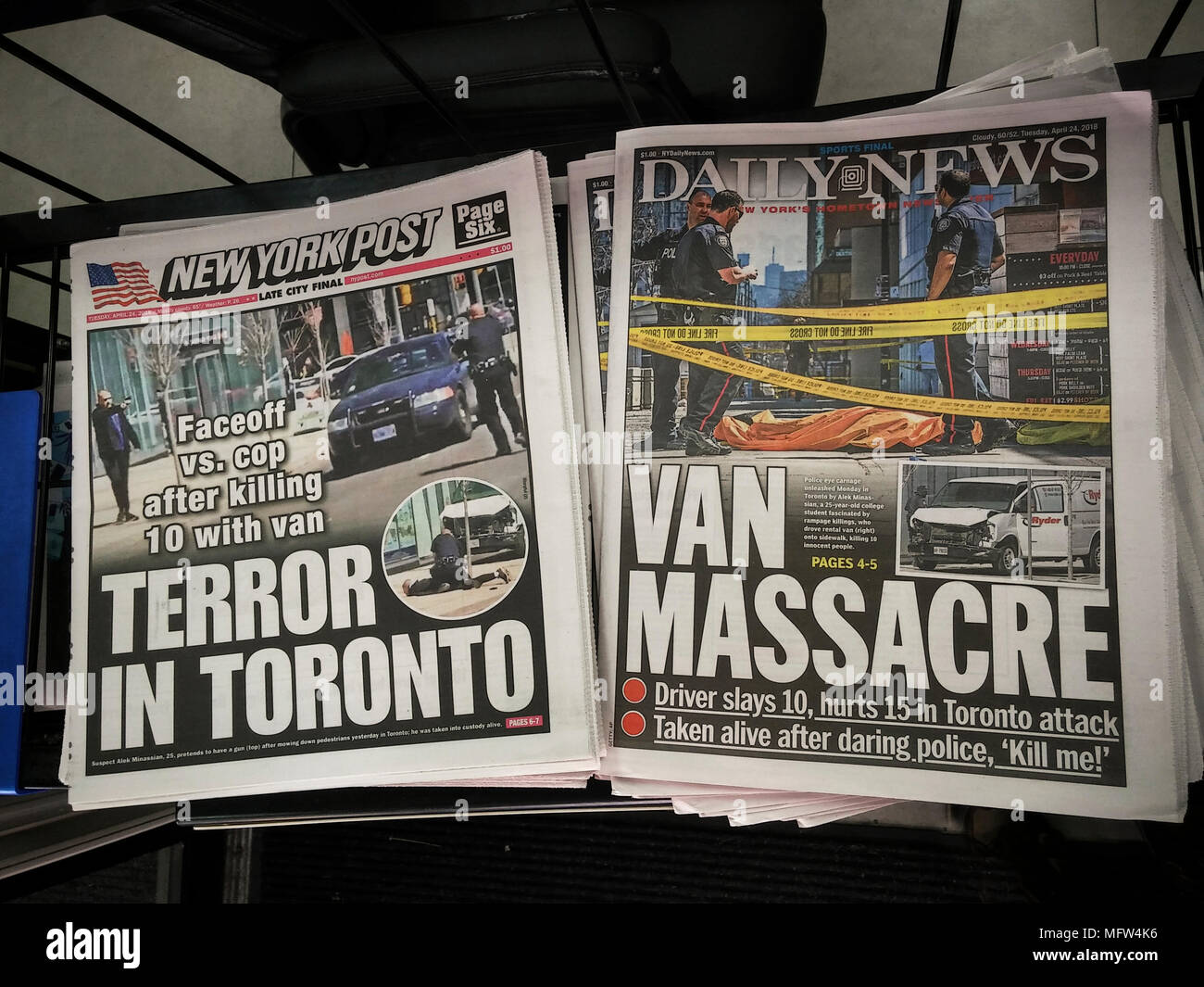 New York newspapers on Tuesday, April 24 report on the previous day's attack in Toronto, Canada where Alek Minassian drove a rented van down a busy Toronto street killing 10 people and injuring 15. (Â© Richard B. Levine) Stock Photo