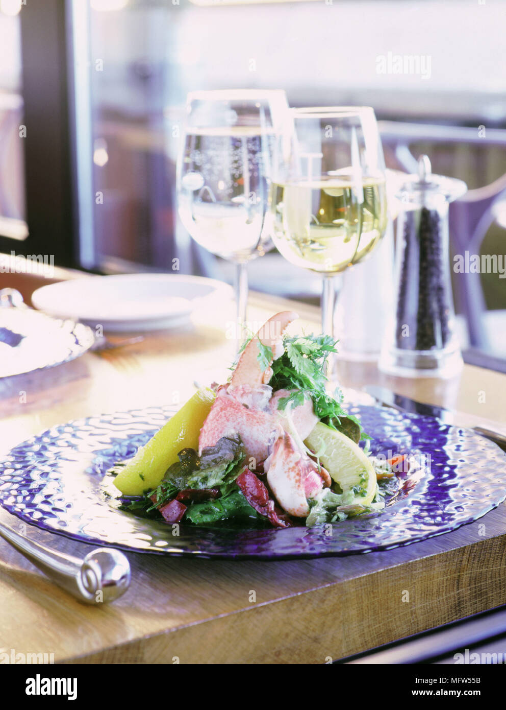 Place setting in the Tower Restaurant Edinburgh with salad on plate Stock Photo