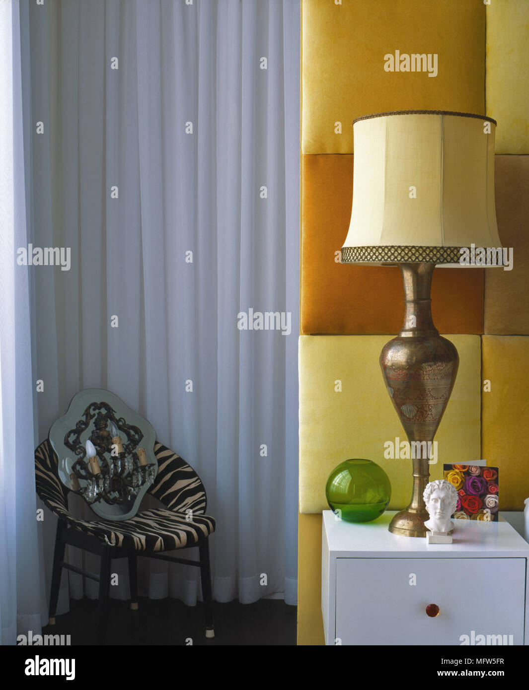 A Detail Of A Modern Bedroom With Upholstered Headboard Panel In
