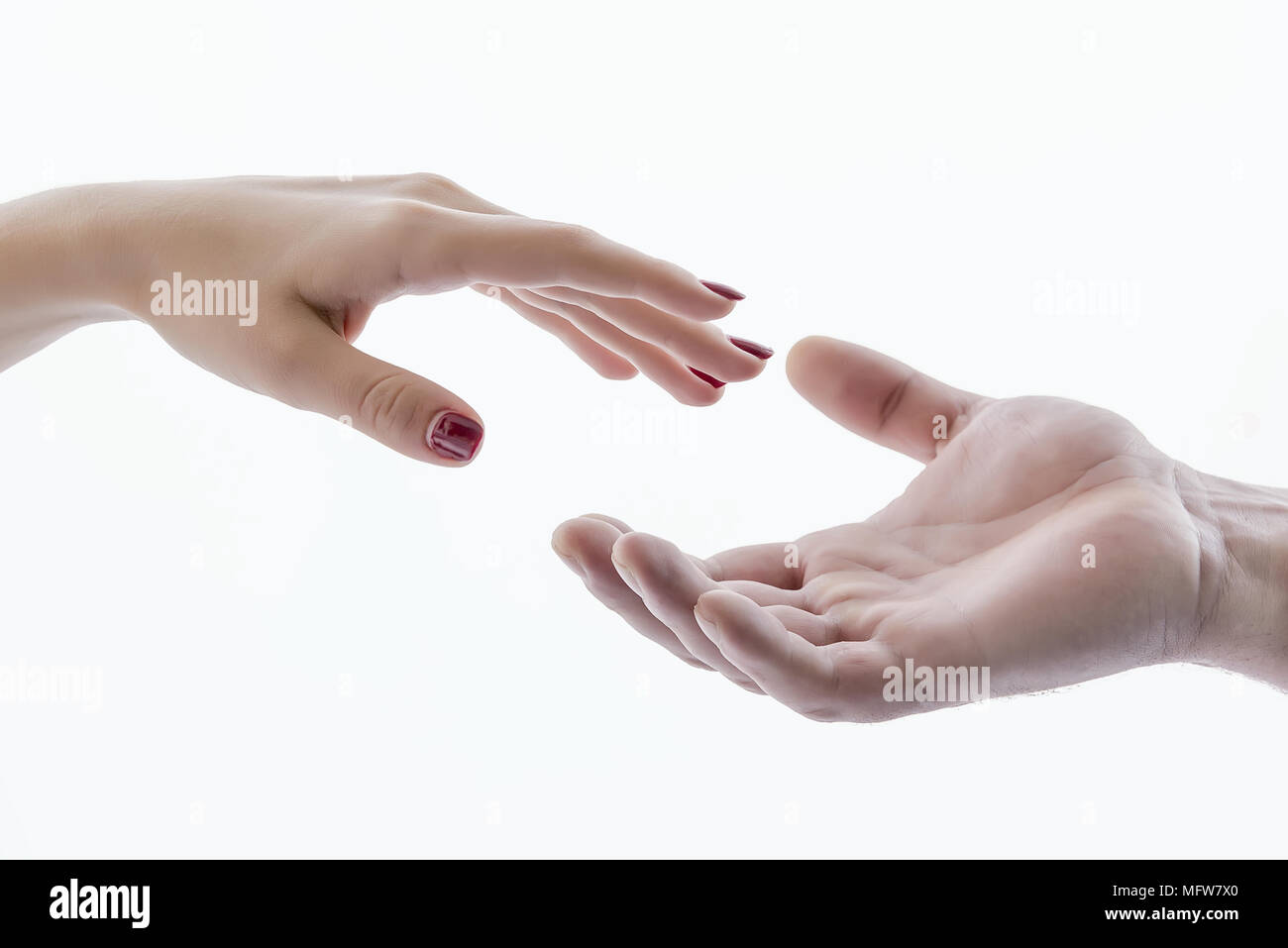 hand shakes hand in greeting, for background and business Stock Photo