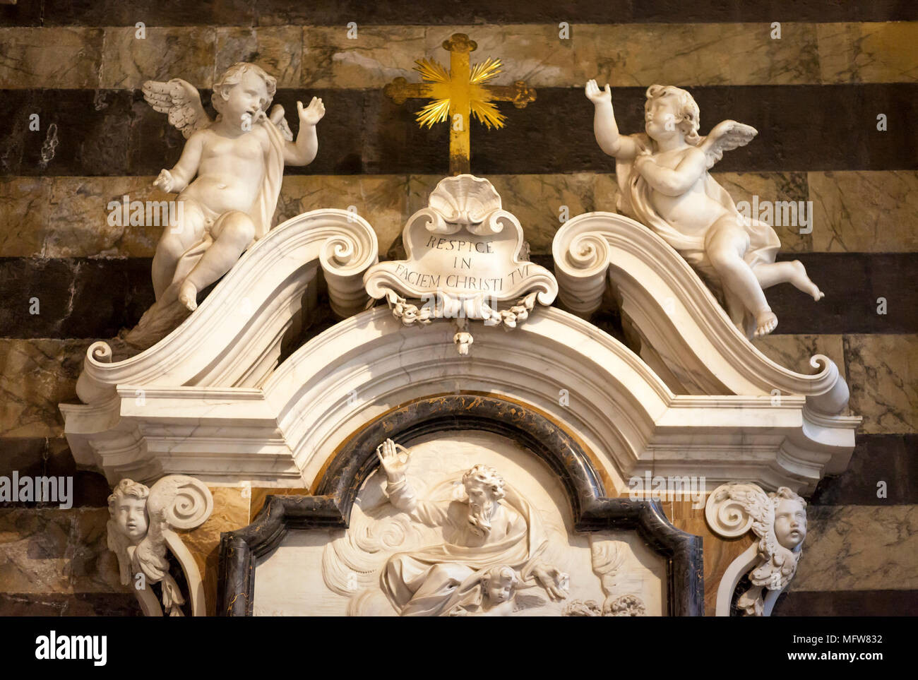 Cherubs and ornate marble carvings along wall inside Pisa Cathedral (Santa Maria Assunta), Pisa, Tuscany Italy Stock Photo