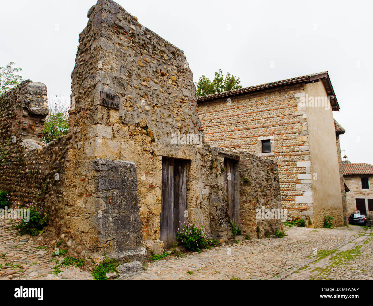 Street of Perouges, France, a medieval walled town, a popular touristic ...