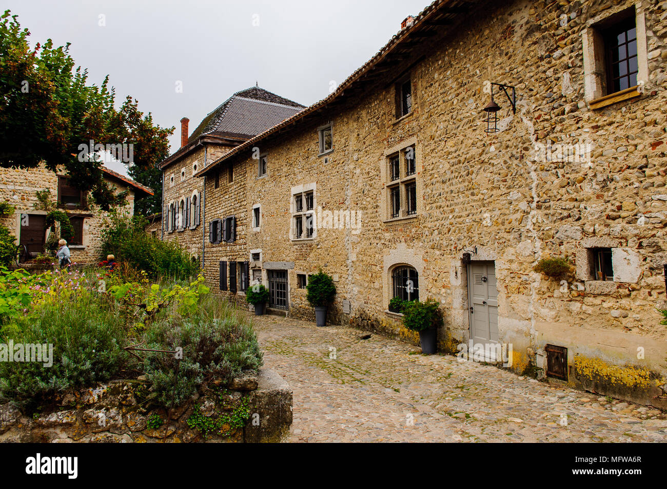 Street of Perouges, France, a medieval walled town, a popular touristic ...