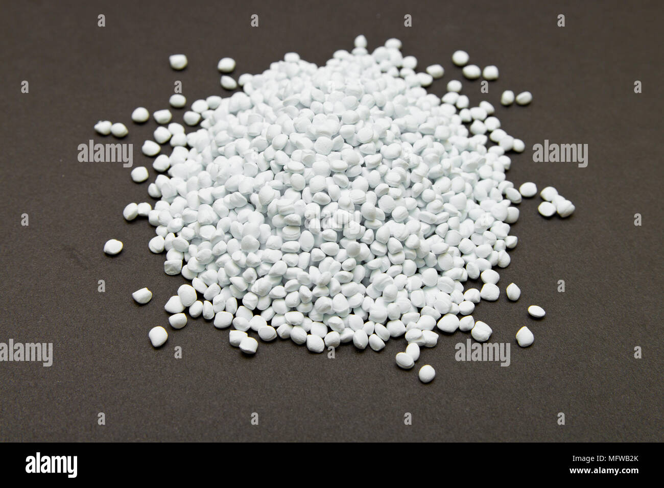 Plastic pellets. White Colorant for plastics. Plastic Raw material