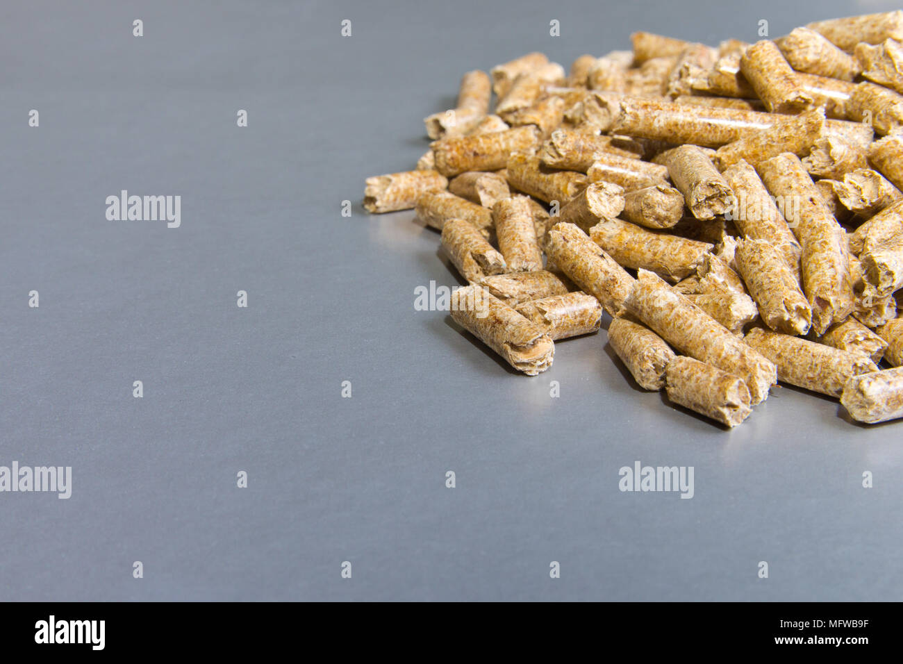 Biofuels. Wood pellets on a silver background.Pellets Biomass - cheap ...