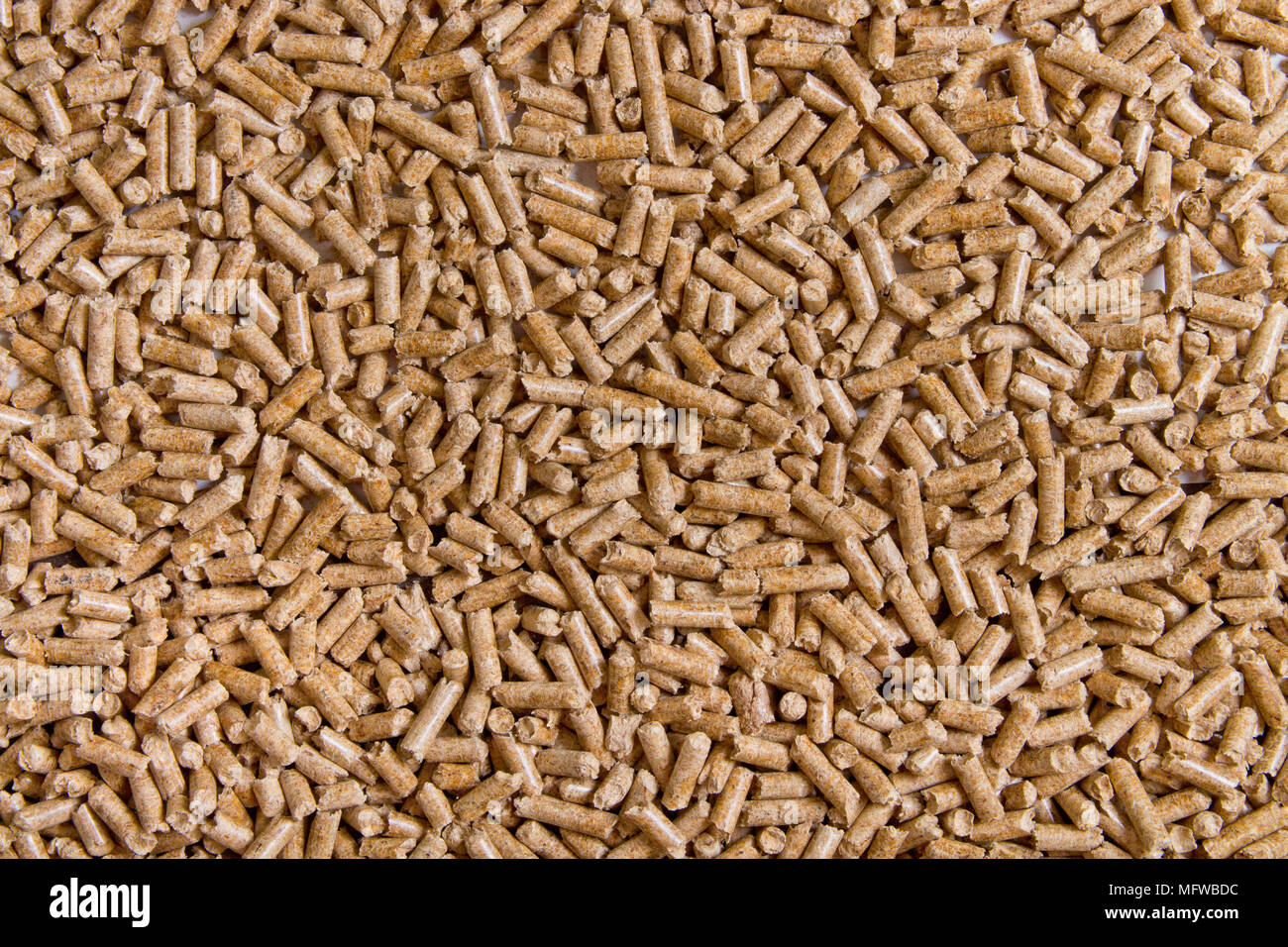 Biofuels. Alternative biofuel from sawdust. Wood pellets background. The  cat litter Stock Photo - Alamy