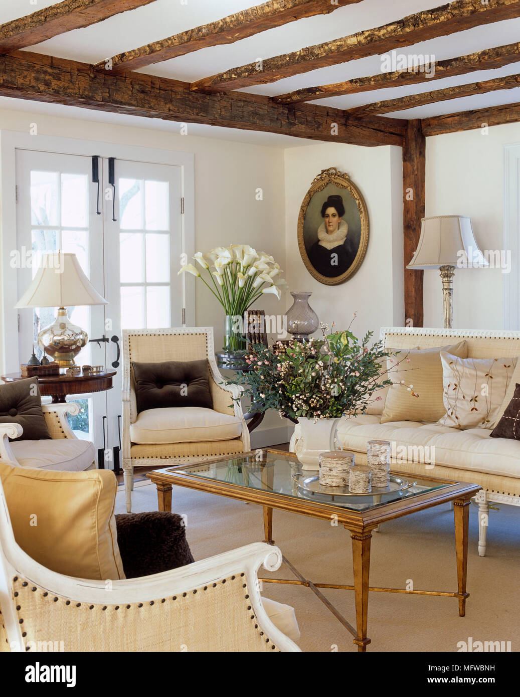 Upholstered Chairs Arranged Around Coffee Table In Country