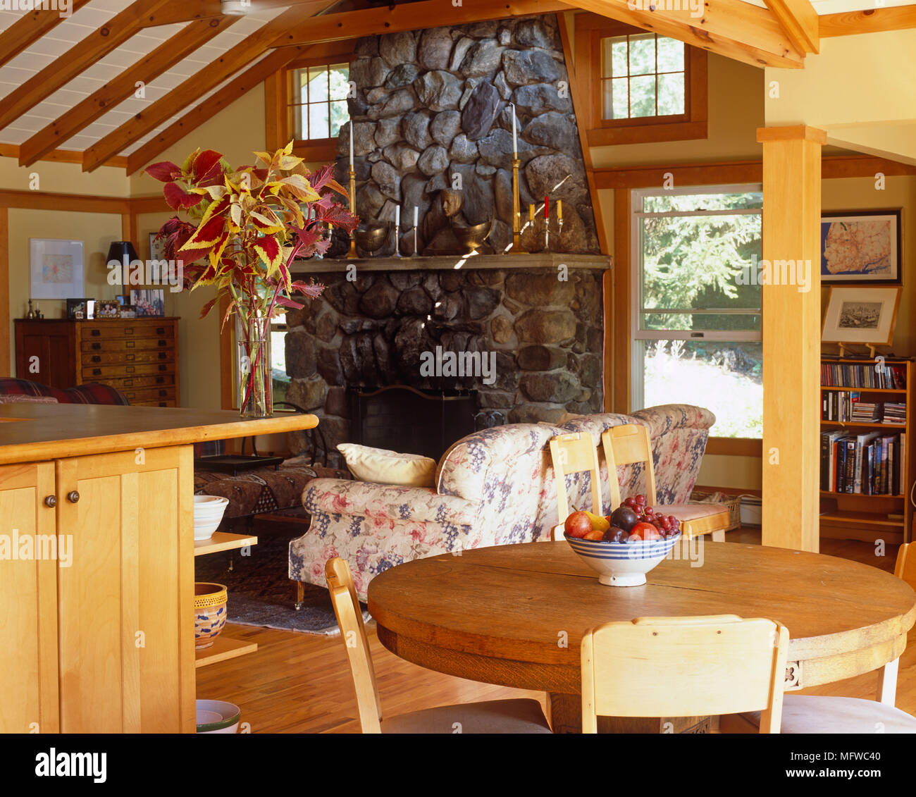 Wooden Table And Chairs In Open Plan Country Style Room With