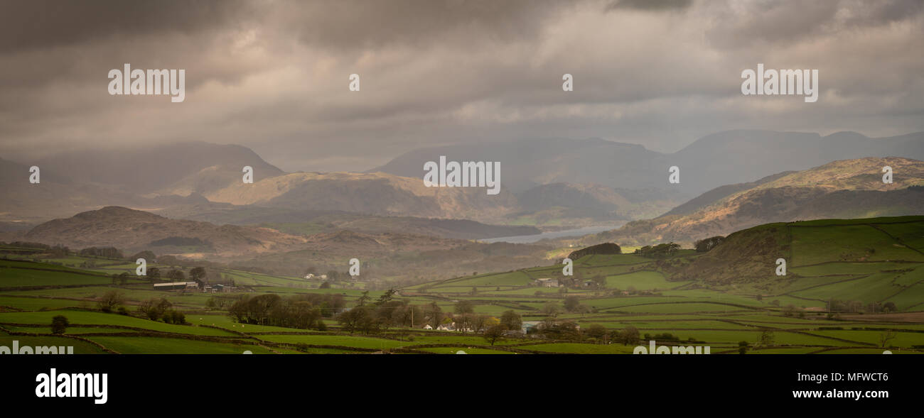 Lowick, the Crake Valley, Coniston Water and the Furness Fells taken from the side of Lowick High Common in Cumbria. Stock Photo