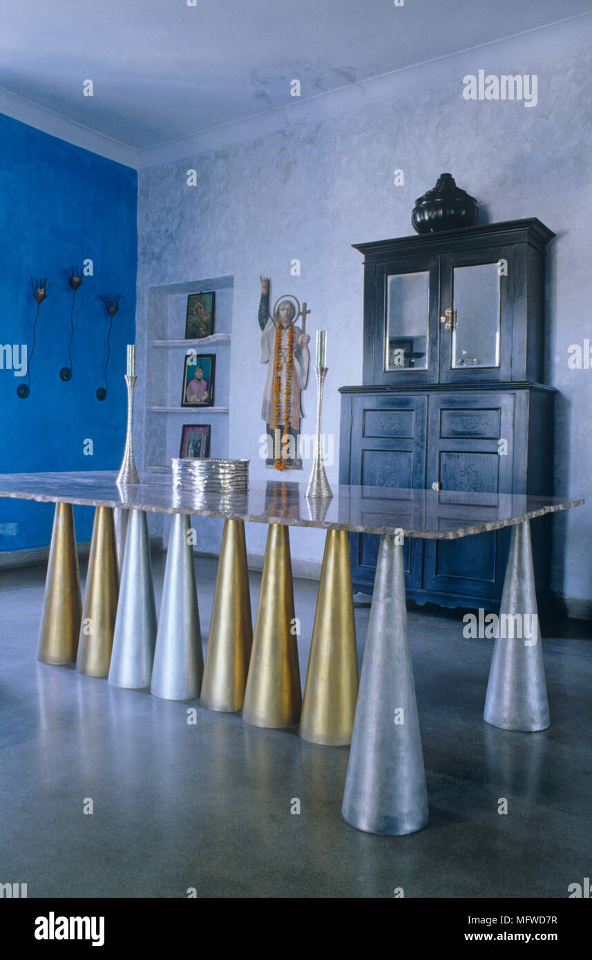 Unusual glass topped table with sheet of glass balanced on conical ...