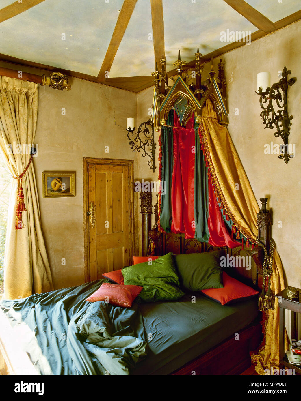 A Gothic Styled Bedroom With Yellow Walls Beamed Ceiling
