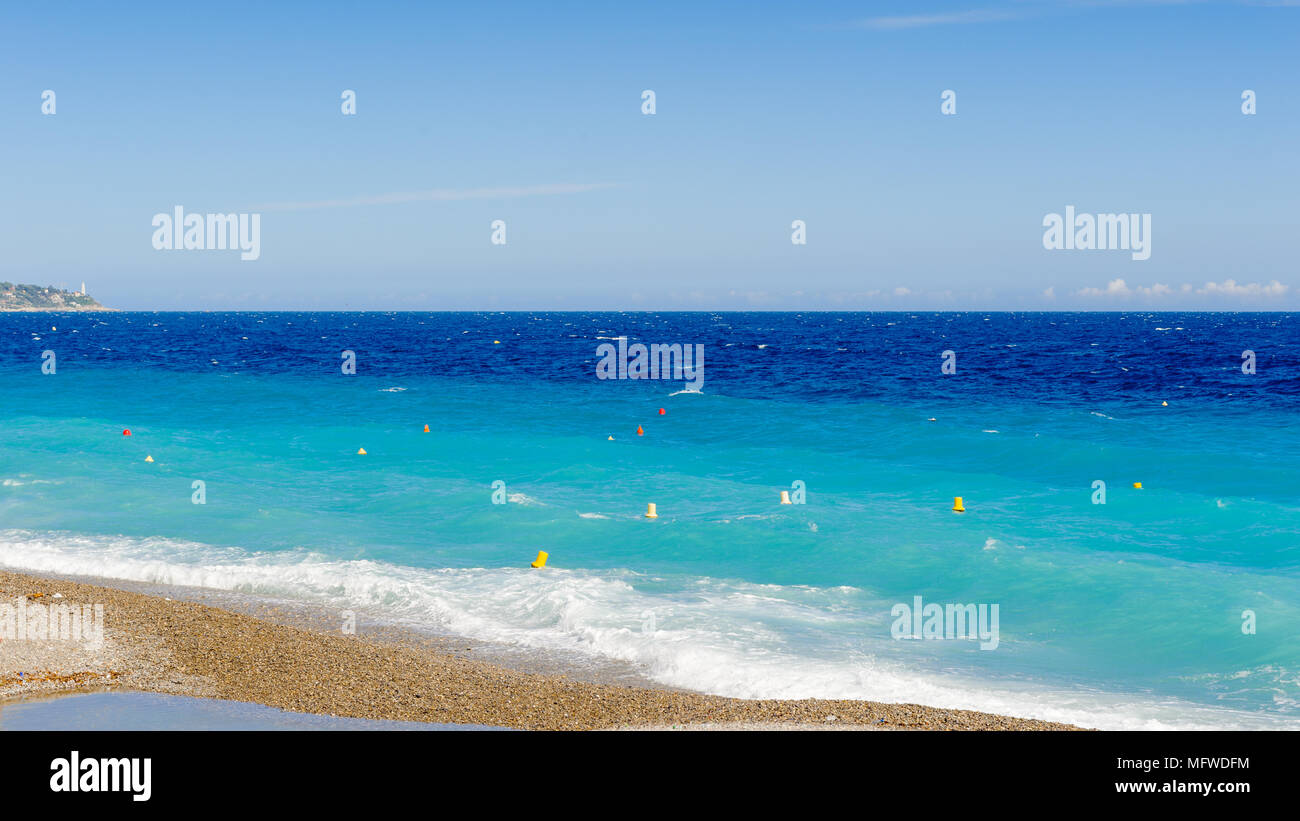 Mediterranea sea coast in Nice, Promenade des Anglais, France. Nice is the capital of the Alpes Maritimes departement Stock Photo