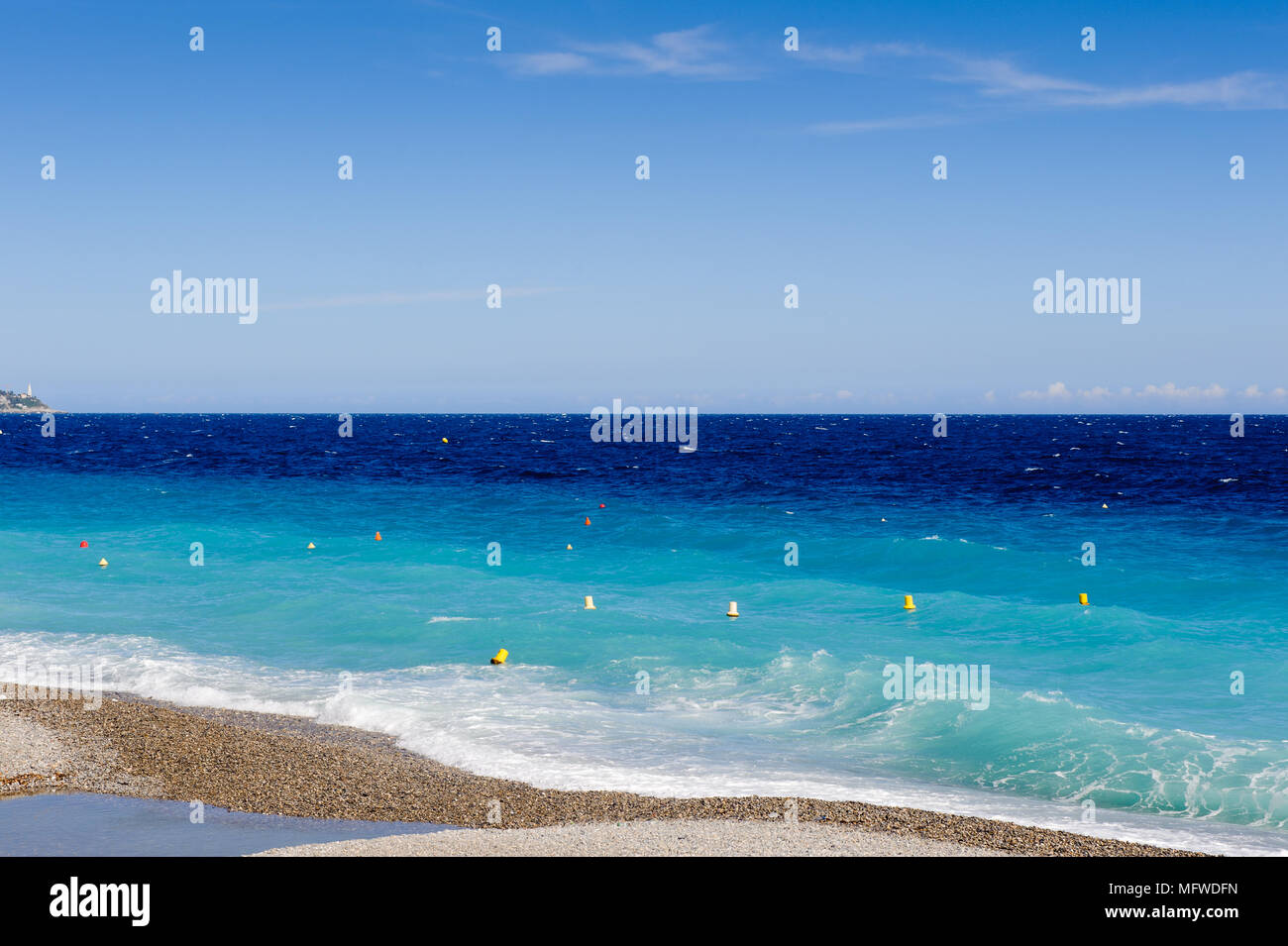 Mediterranea sea coast in Nice, Promenade des Anglais, France. Nice is the capital of the Alpes Maritimes departement Stock Photo