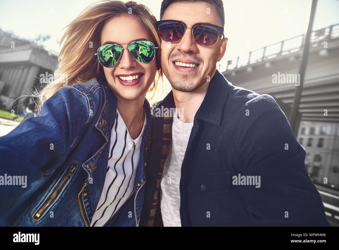 Happy young couple in love takes a selfie portrait Stock Photo - Alamy