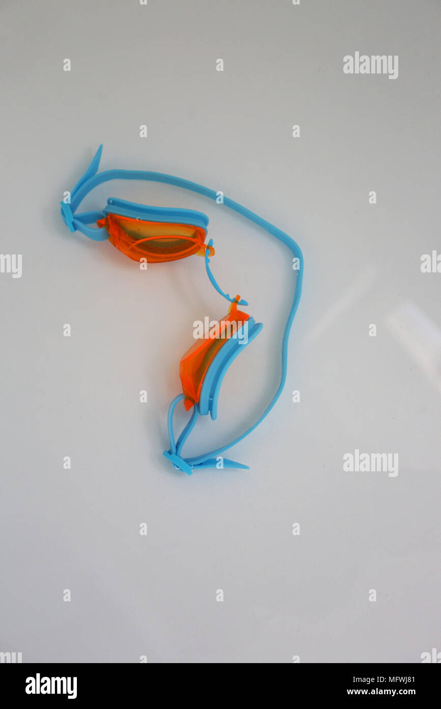 A pair of googles pictured in the bath in Chichester, West Sussex, UK. Stock Photo