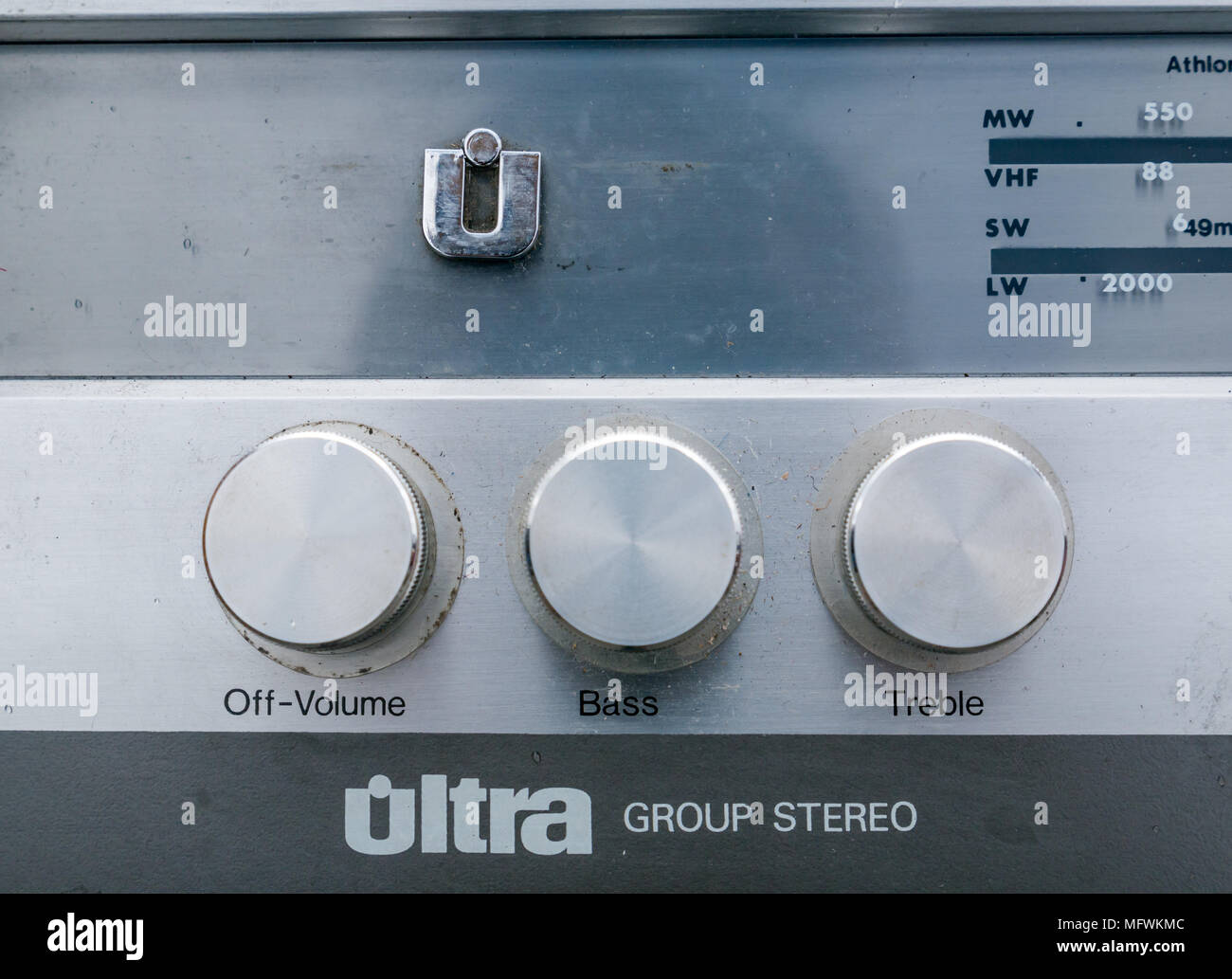 Detail of old fashioned vintage Ultra stereo turntable radio in lane sale auction, Leith, Edinburgh, Scotland, UK with volume bass and treble controls Stock Photo