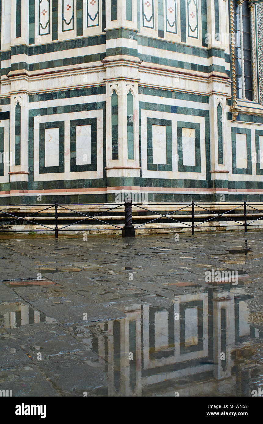 Duomo reflecting in a puddle during a rain storm, Florence, Italy Stock ...