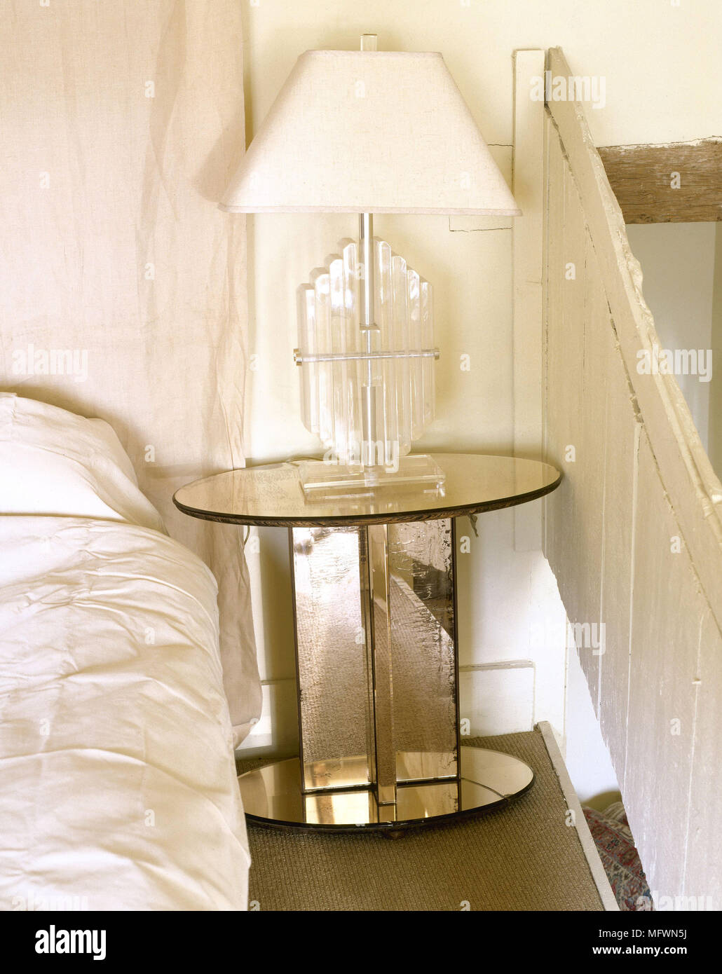 Bedside lamp on art deco style bedside table Stock Photo Alamy