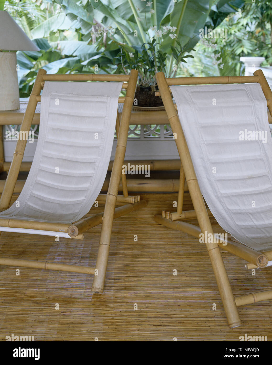 Two bamboo chairs on balcony Stock Photo Alamy