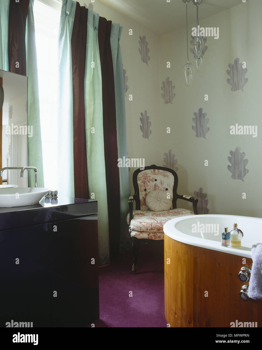 Bathroom With Circular Wood Panelled Next To Washbasin On Purple