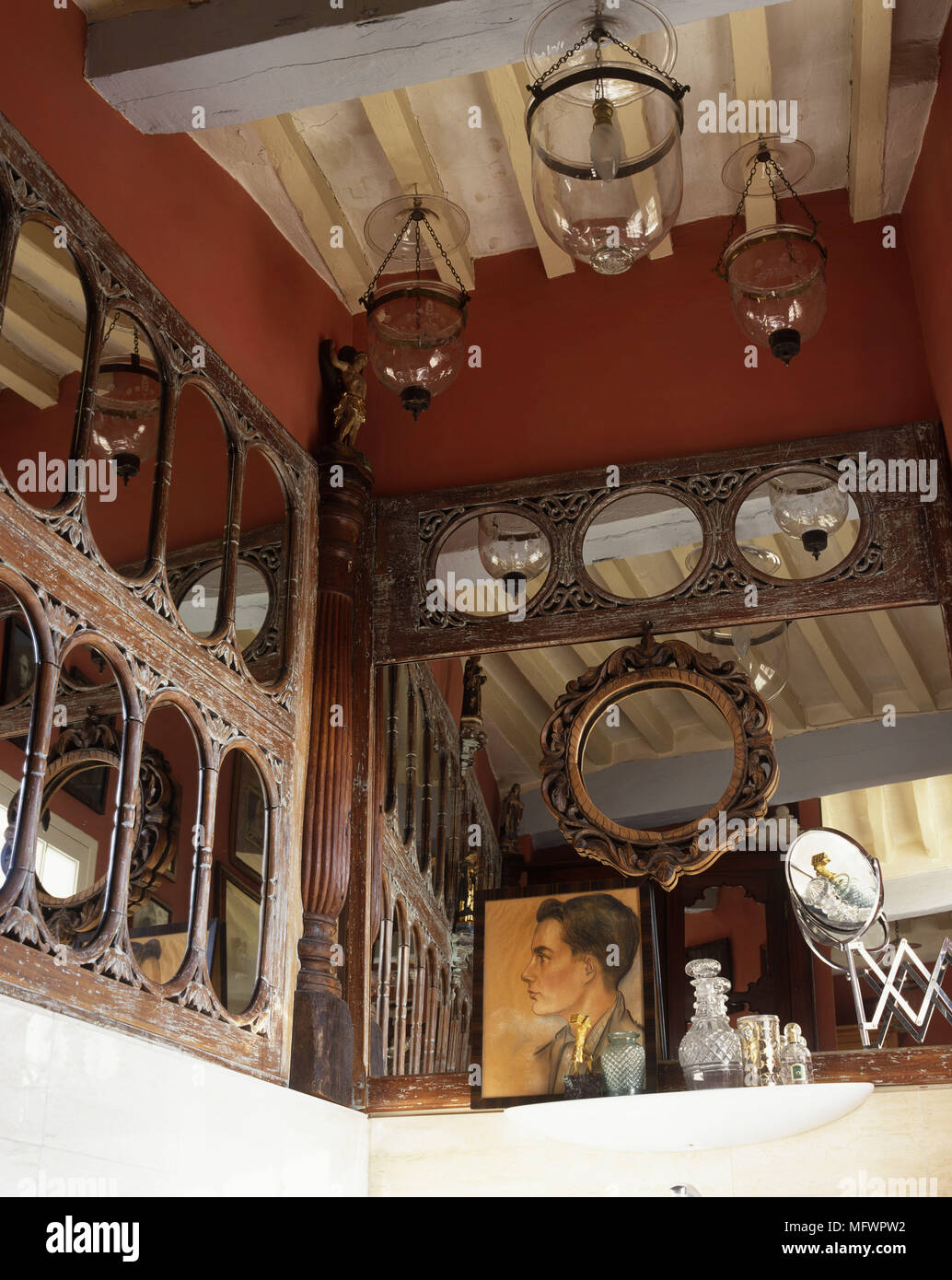 High Ceiling With Mirrors And Glass Lampshades Suspended