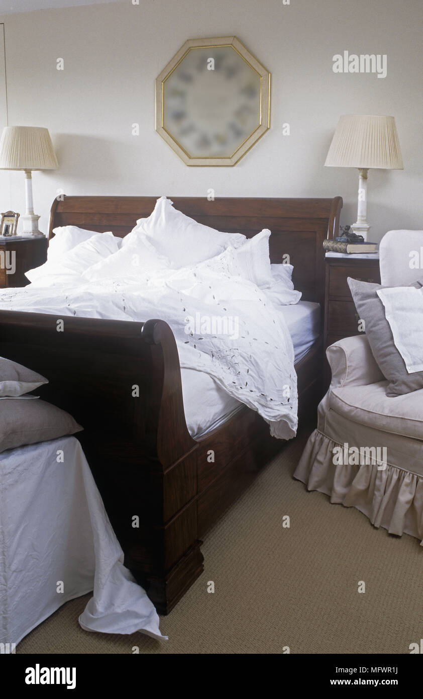 Wooden Sleigh Bed With White Linen Stock Photo - Alamy - Wooden Sleigh Bed With White Linen Stock Photo - Alamy