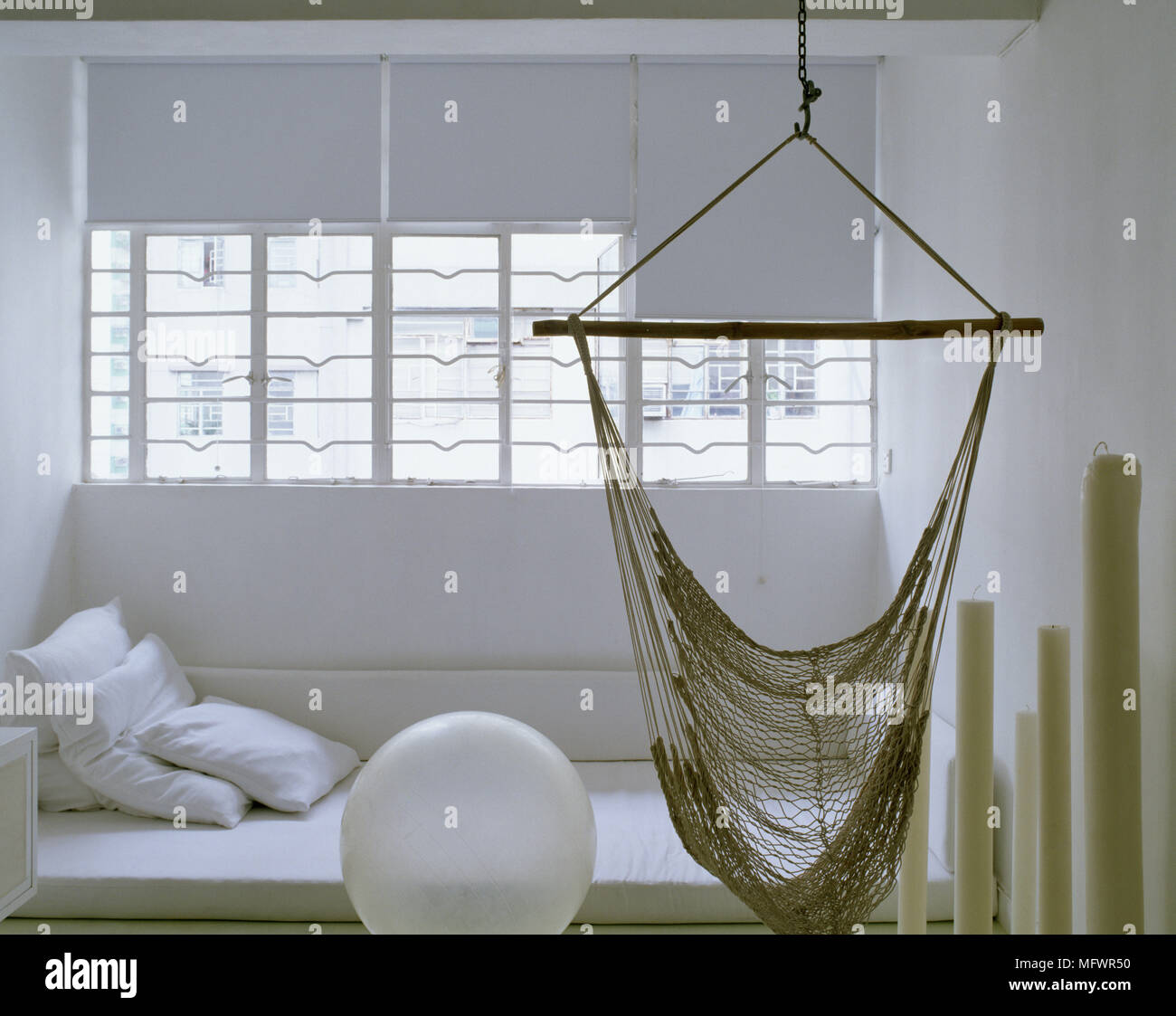 Hammock suspended hi res stock photography and images Alamy