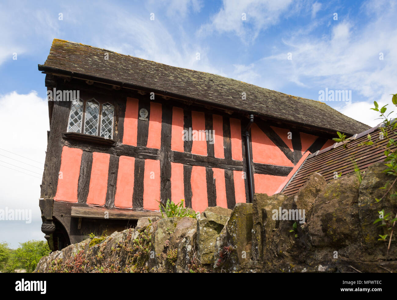 Black and pink timber framed house, Weobley, Herefordshire UK Stock Photo