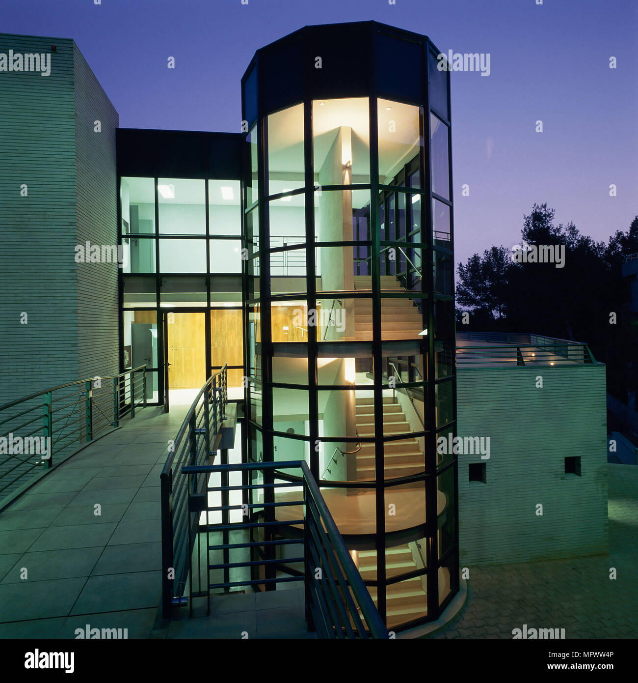 View of a bridge connected to an office building Stock Photo