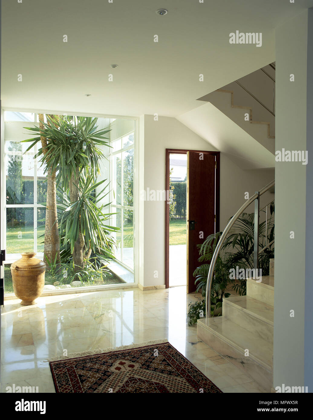 View of an open door at the entrance of a house Stock Photo