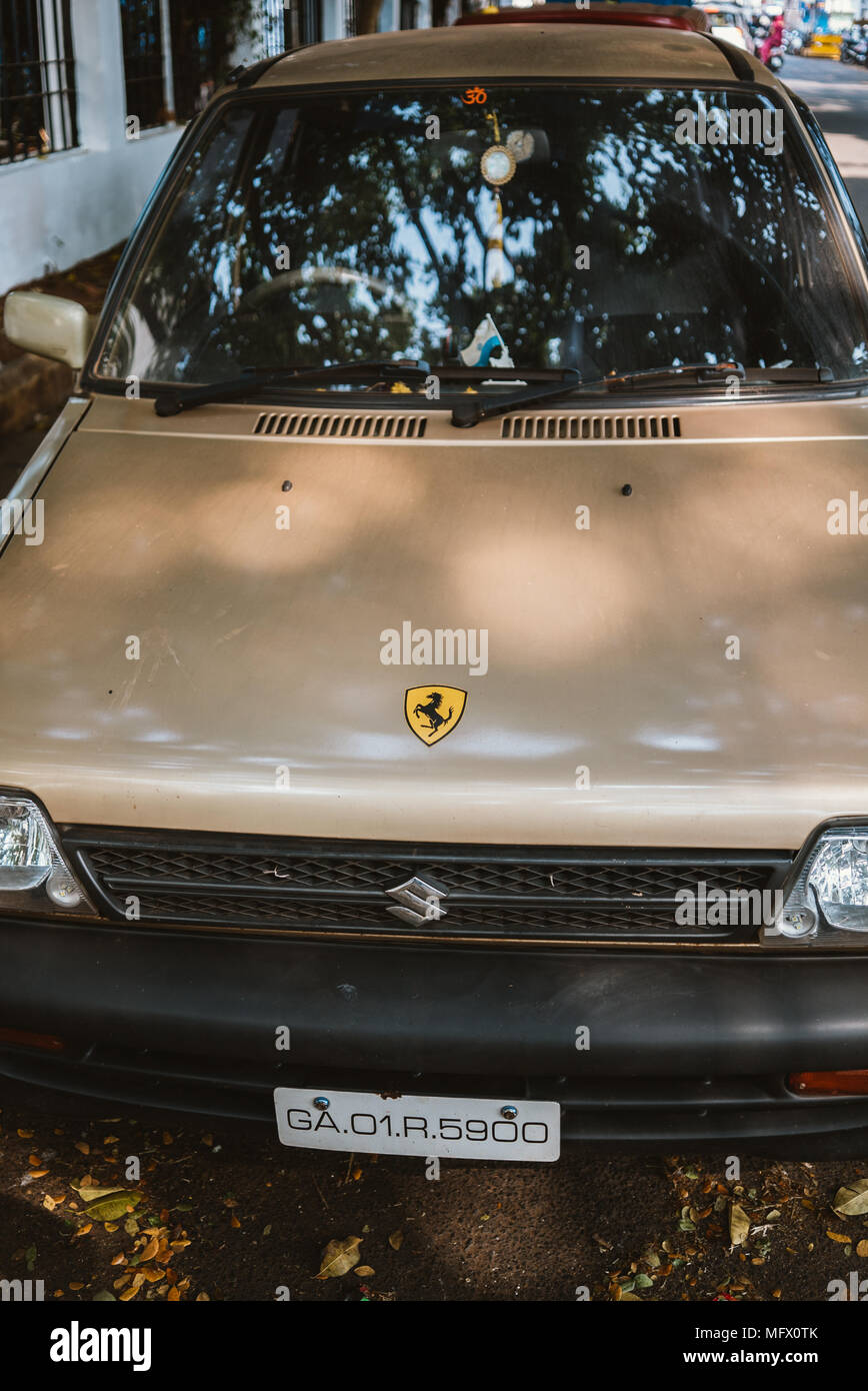 https://c8.alamy.com/comp/MFX0TK/old-suzuki-with-ferrari-sticker-parked-on-street-in-panaji-goa-india-MFX0TK.jpg