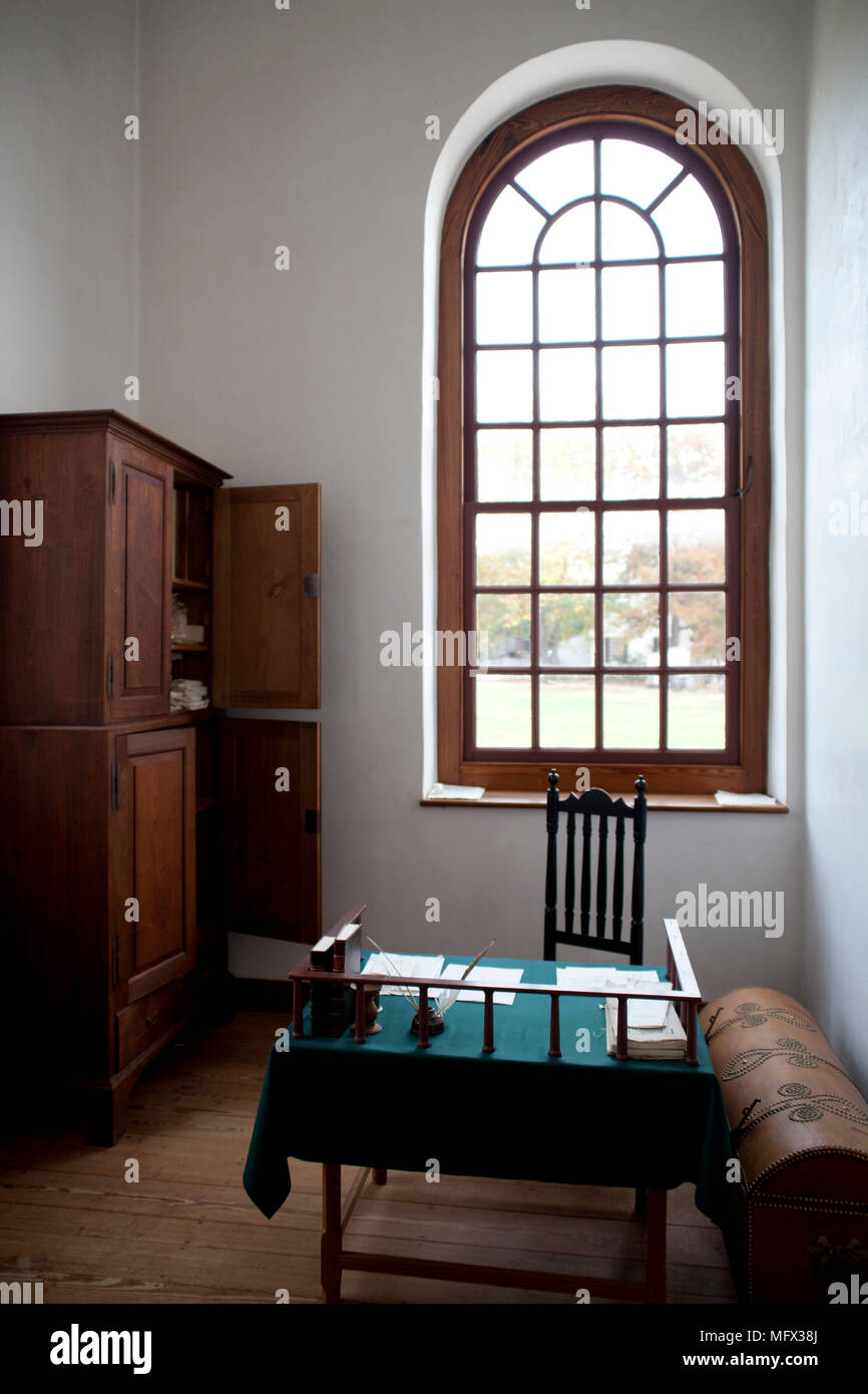 Restored antique office interior in colonial Williamsburg Virginia with