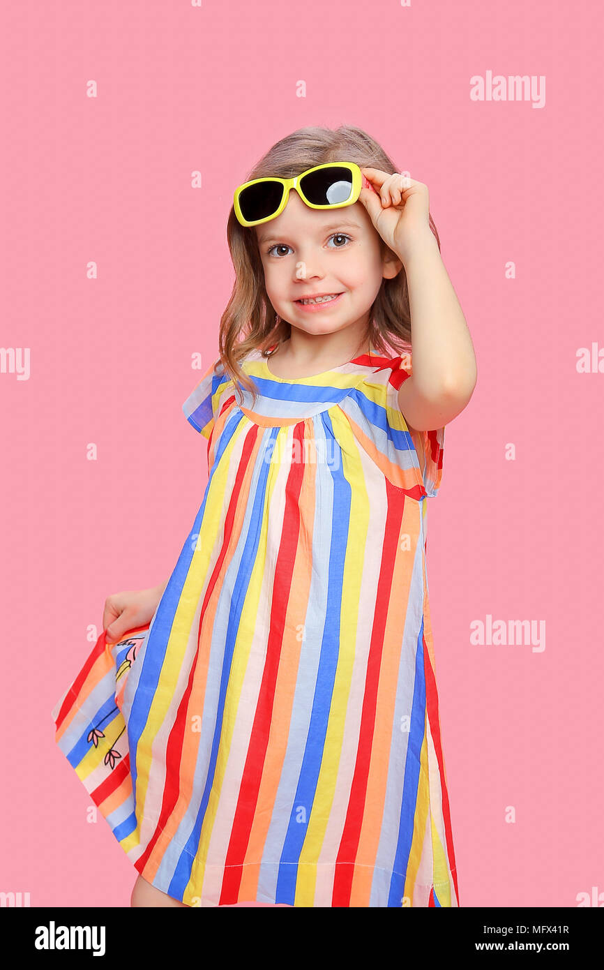 Carefree girl in colorful dress hi-res stock photography and images - Alamy