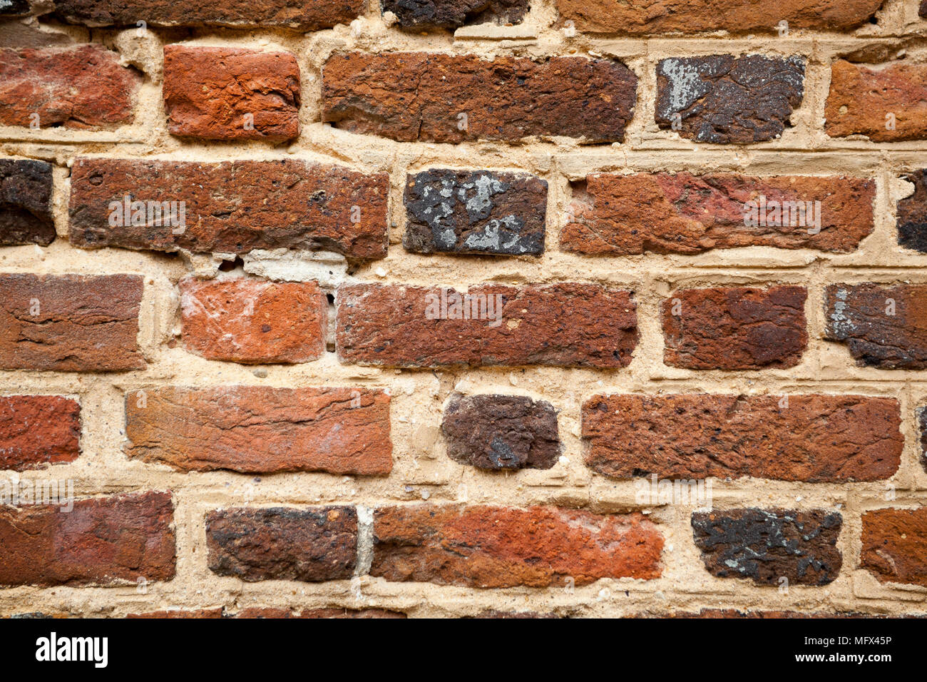 Antique early American handmade brick wall in Colonial Williamsburg