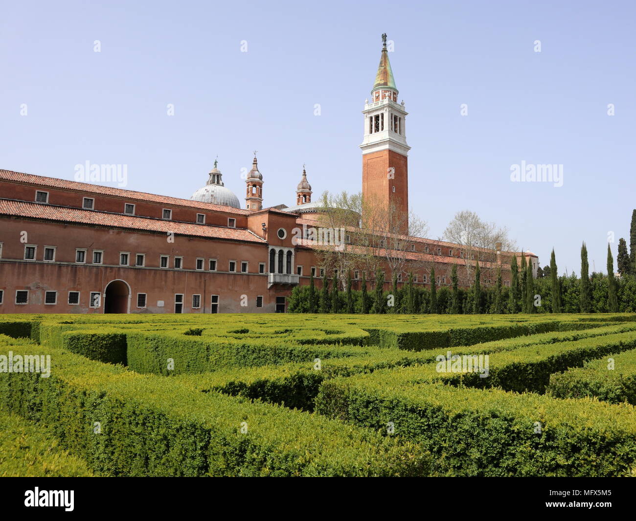 Monastery of San Giorgio Maggiore with bell tower and the garden maze, sunny day, Venice, Italy, Europe Stock Photo