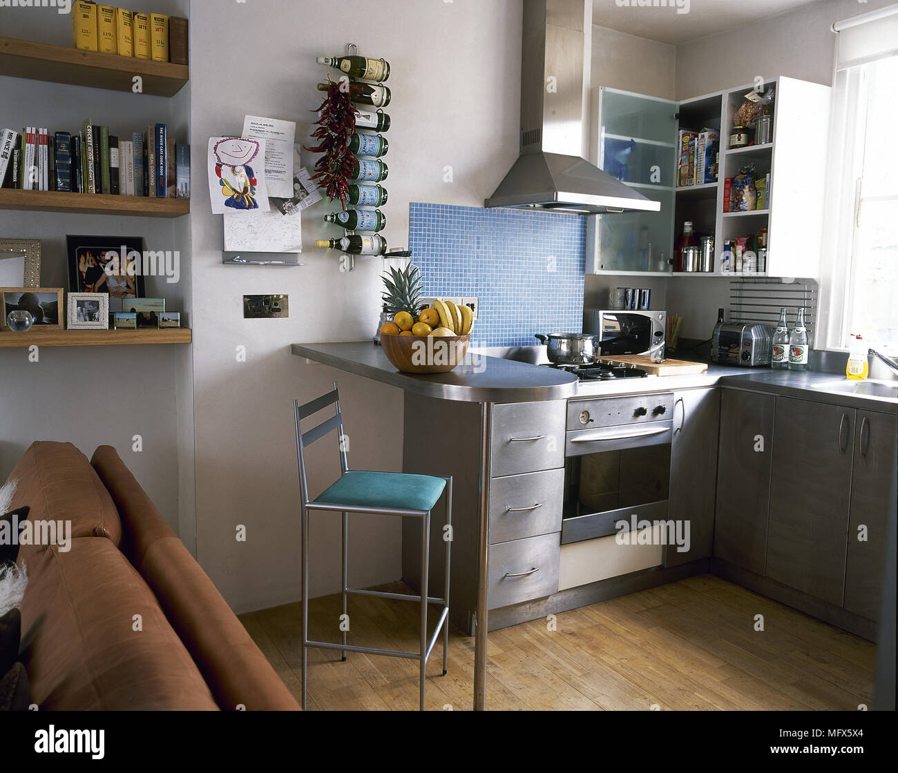 Modern Apartment Kitchen With Wood Floor Breakfast Bar And Stool