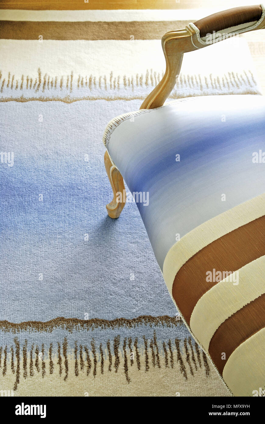 Period style sofa with stripe pattern upholstery Stock Photo