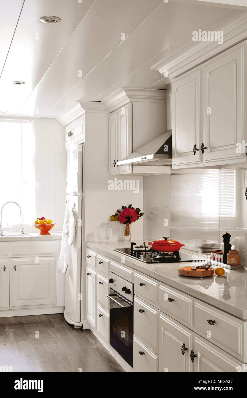 Modern kitchen with white units Stock Photo