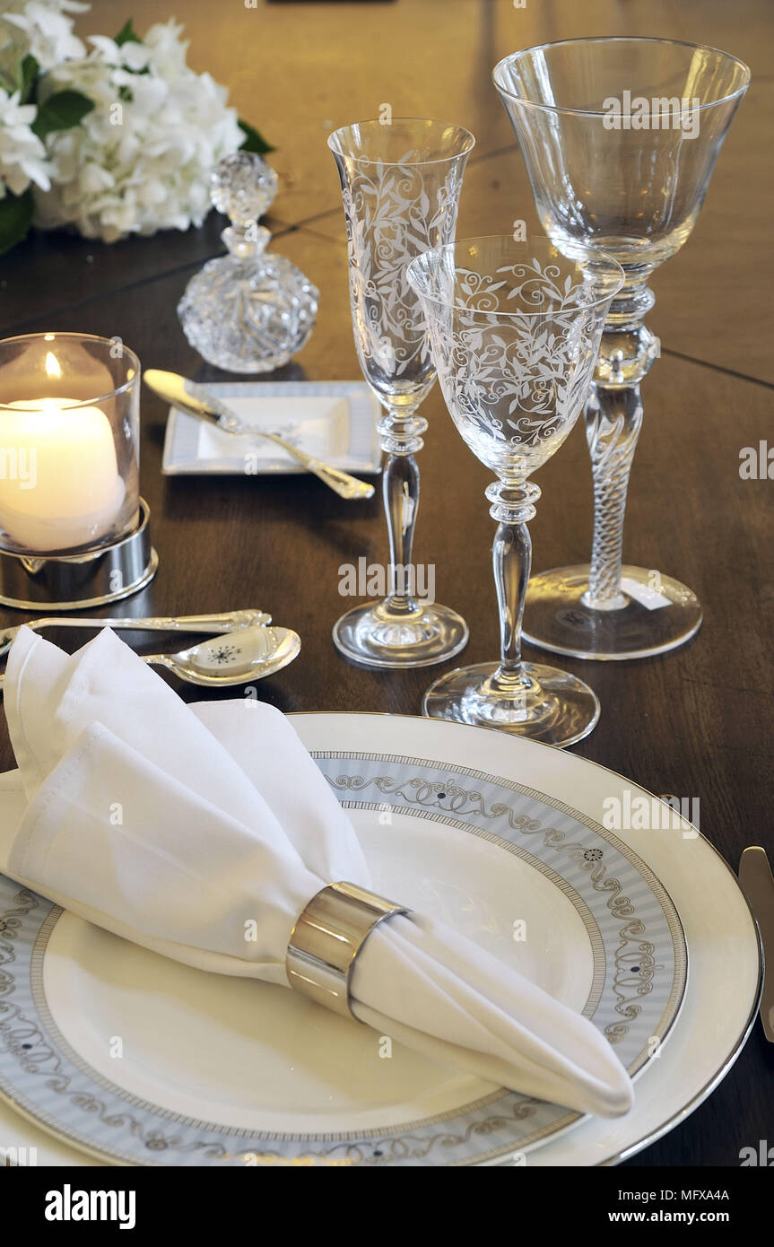 Traditional style place setting with napkin in silver ring Stock Photo