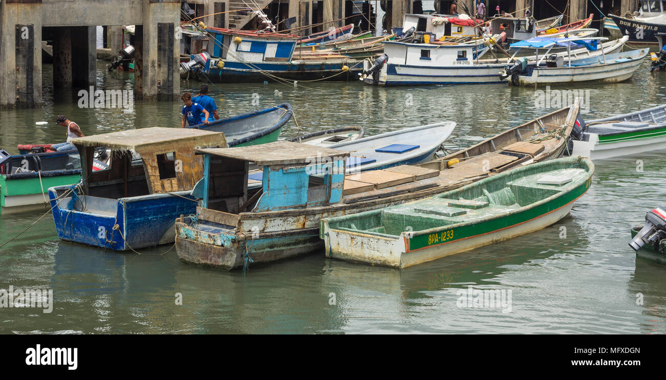 Old fishing boats lined up at the fish market in Panama City, Panama Stock Photo