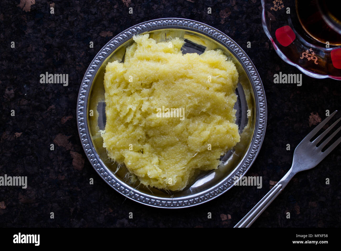 Turkish Cheese halva / Peynir Helvasi with Tea. (Turkish Traditional