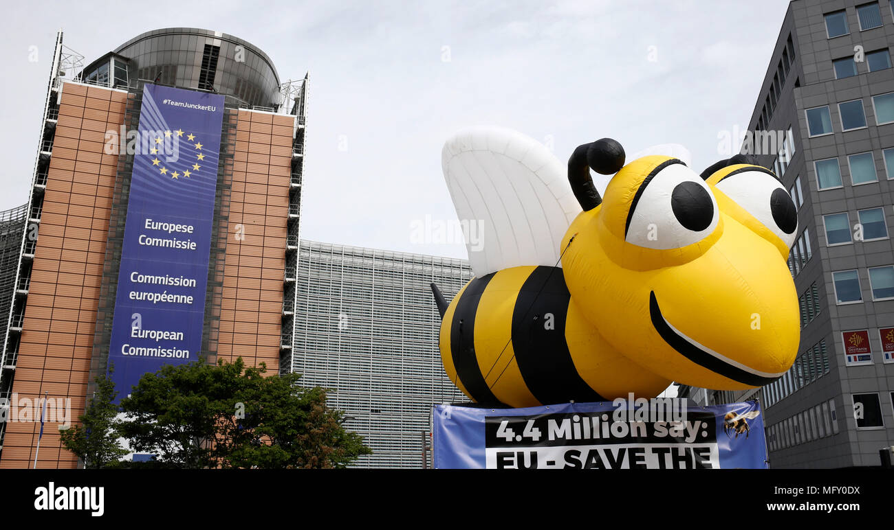 Brussels, Belgium. 27th April 2018. A giant inflated model of a bee during a demonstration in front of the European Commission offices calling the EU to adopt a ban on bee-killing neonicotinoid pesticides. Alexandros Michailidis/Alamy Live News Stock Photo
