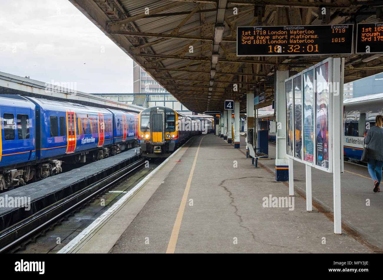 A train arrives at Portsmouth Harbour Railway Station. Stock Photo