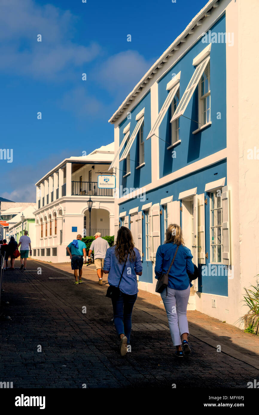 Tourists wandering the cobblestone streets of St. George's, Bermuda. Stock Photo