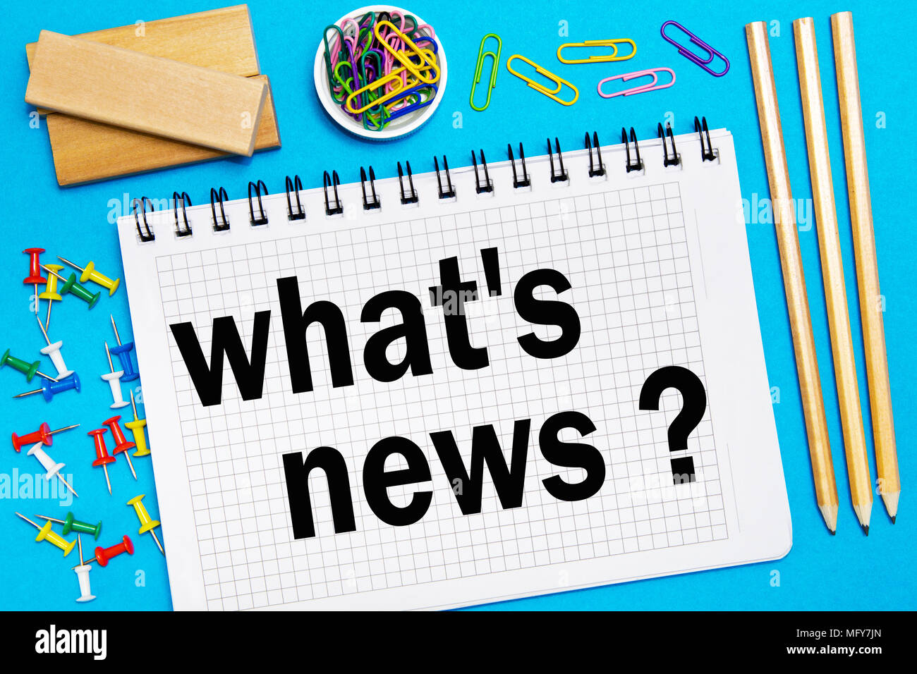 Notebook With Notes What S News With Office Tools On A Blue Background Concept What S News Stock Photo Alamy