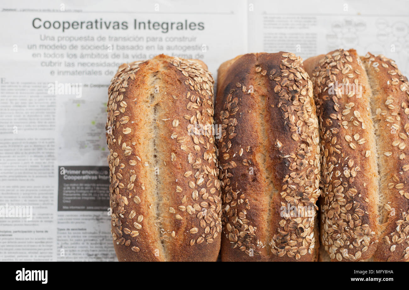 Loaves of bread on a Spanish newspaper Stock Photo