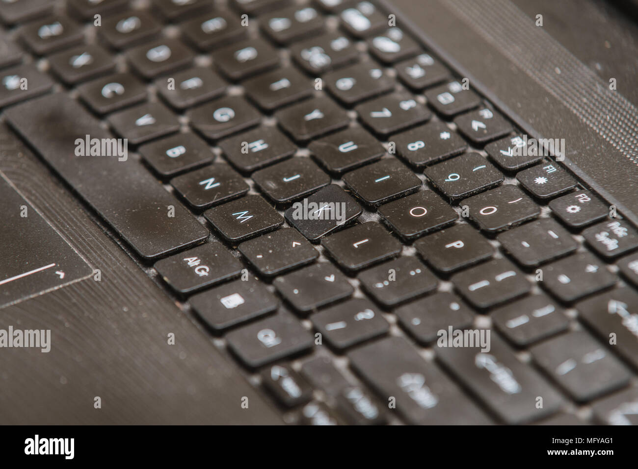 close up on dirty computer keyboard with broken letter Stock Photo