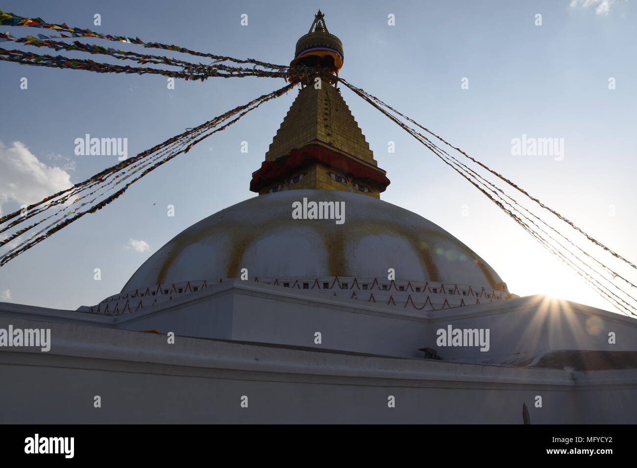 Sunrays in the corner of Boudhanath Stupa, Kathmandu, Nepal Stock Photo